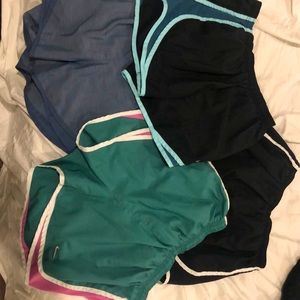 Four Nike shorts